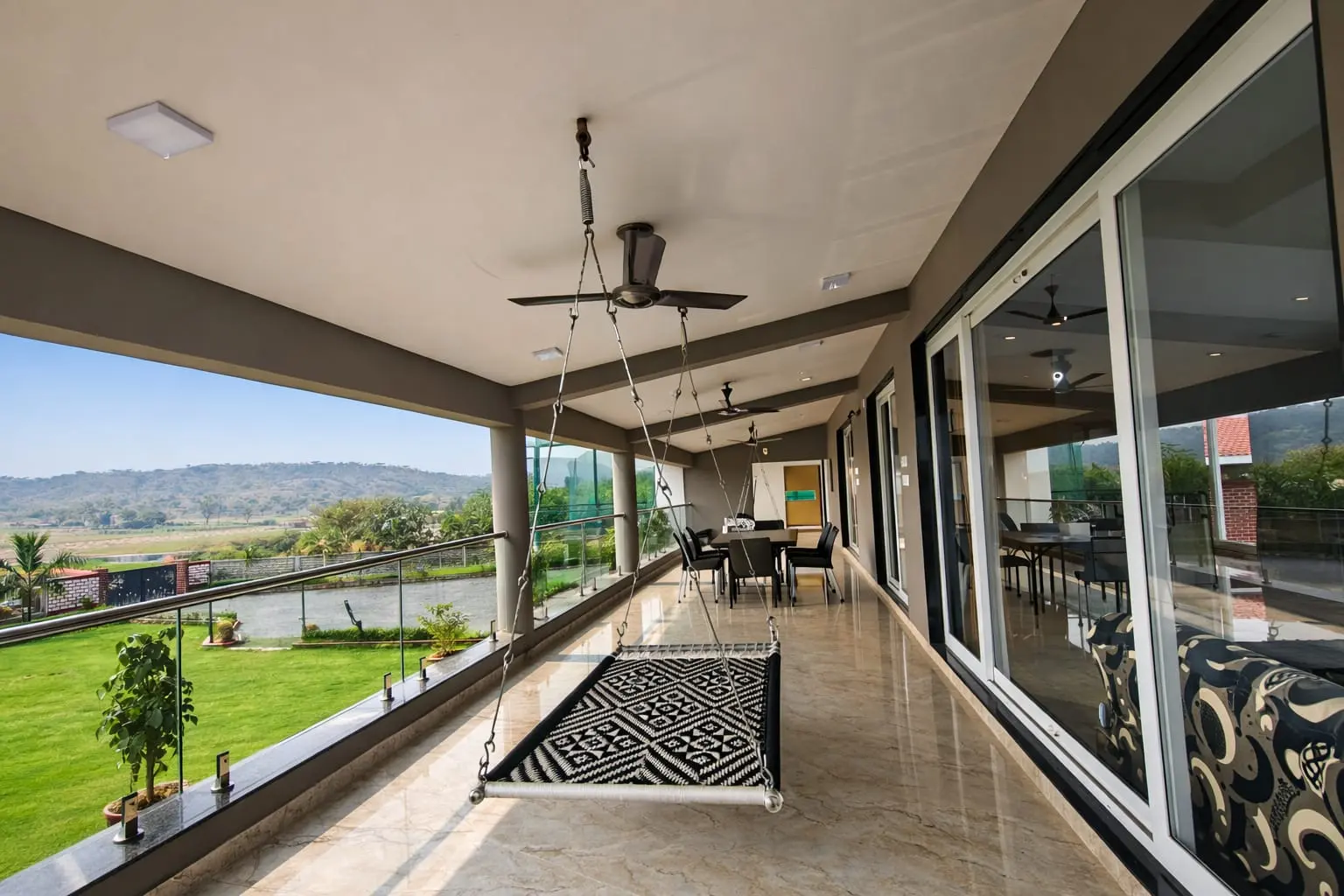 Sanskar Farm Villa — swing in the garden